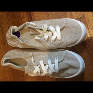 Khaki colored slip on tennis shoes. Size 8.5.